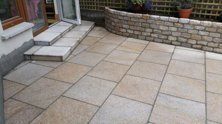 Brown Granite Patio with Raised Granite Flowerbed